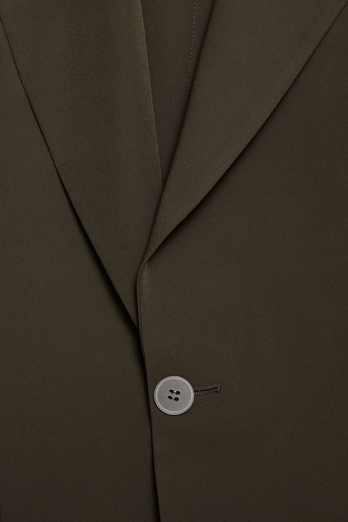 Americana técnica elástica verde