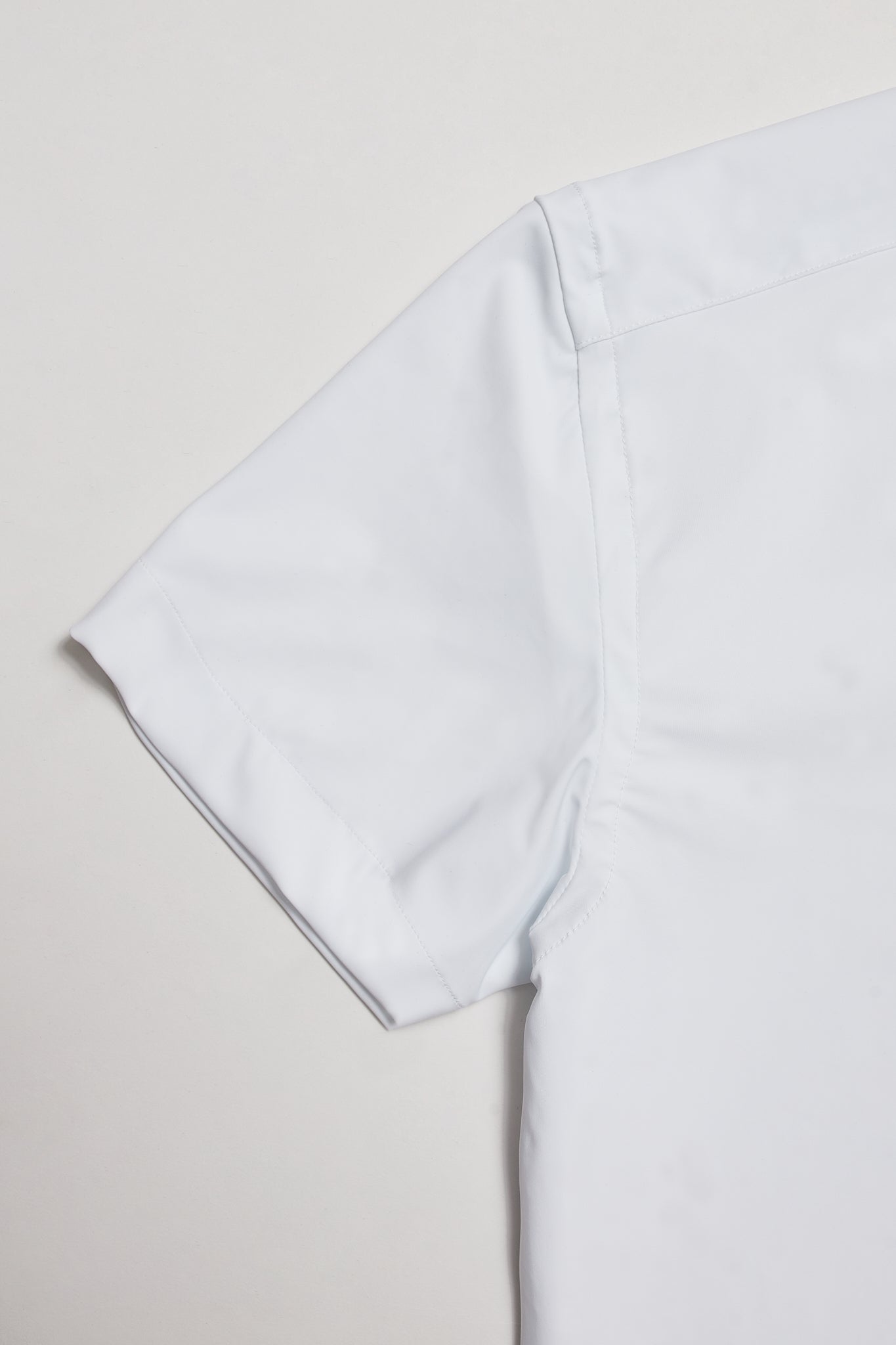 Polo técnico blanco