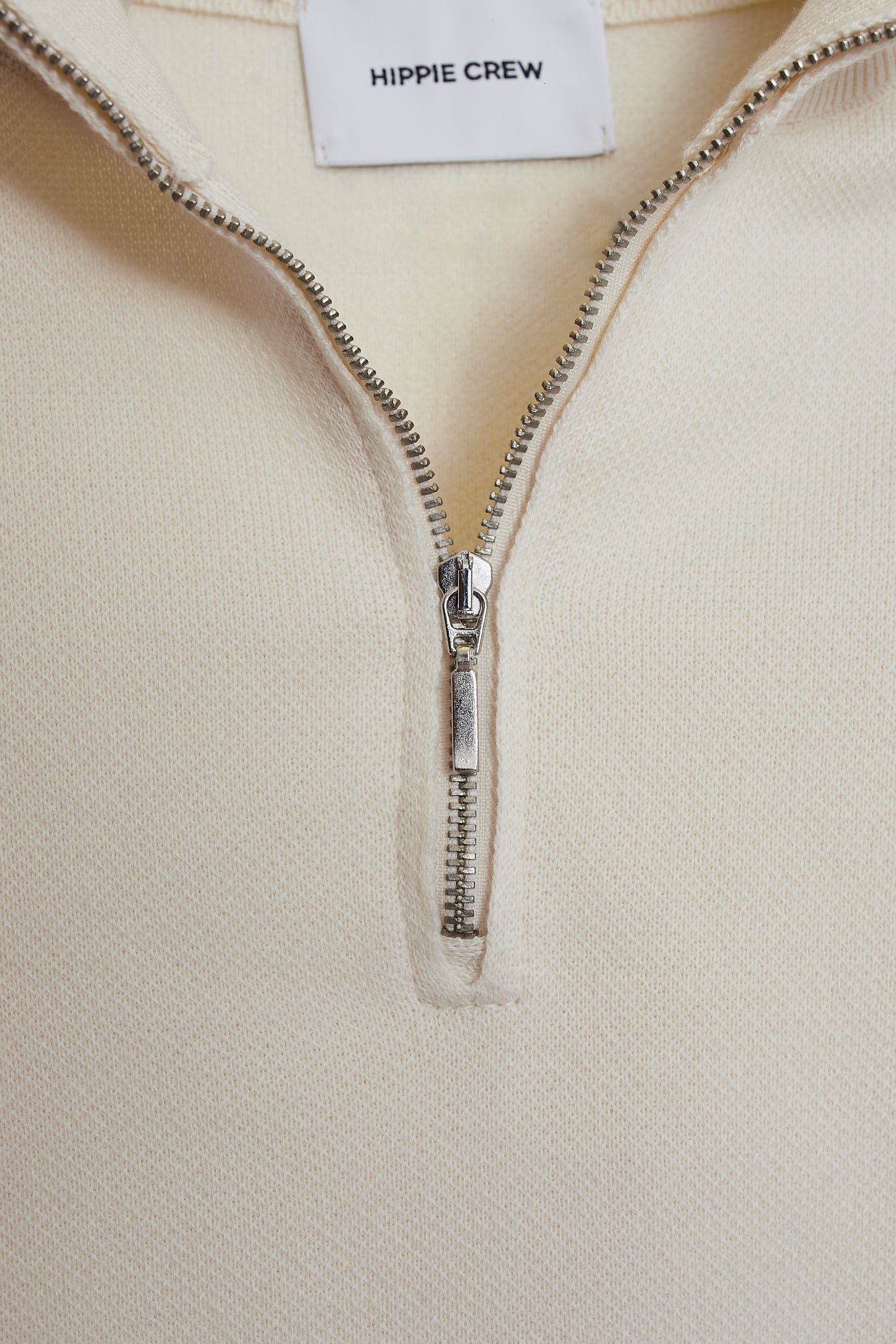 Jersey cremallera crema