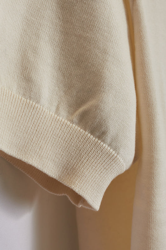 Polo punto crema