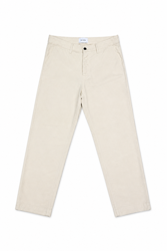 Pantalón denim relaxed crema