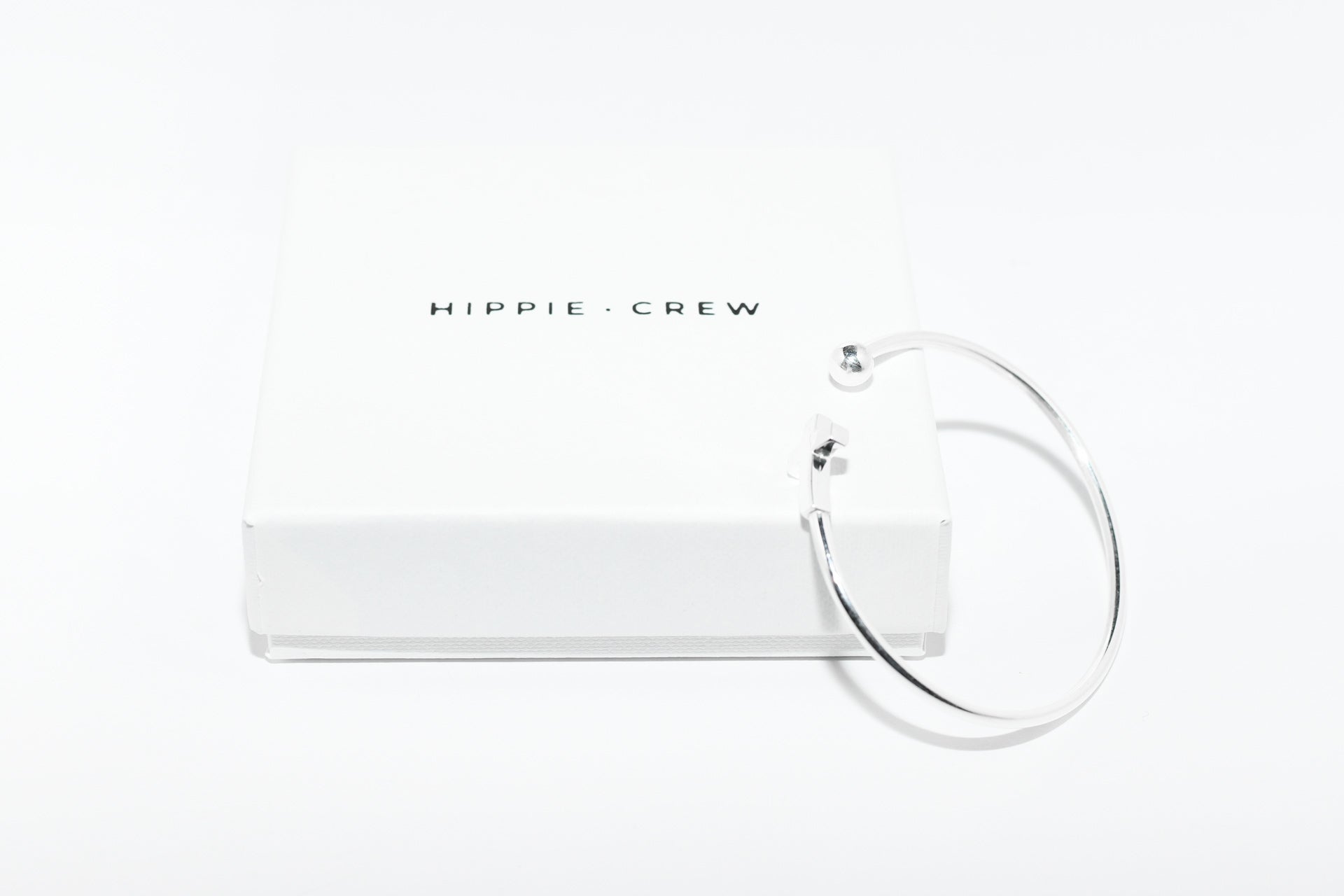 Pulsera plata cruz y bola Hippie Crew