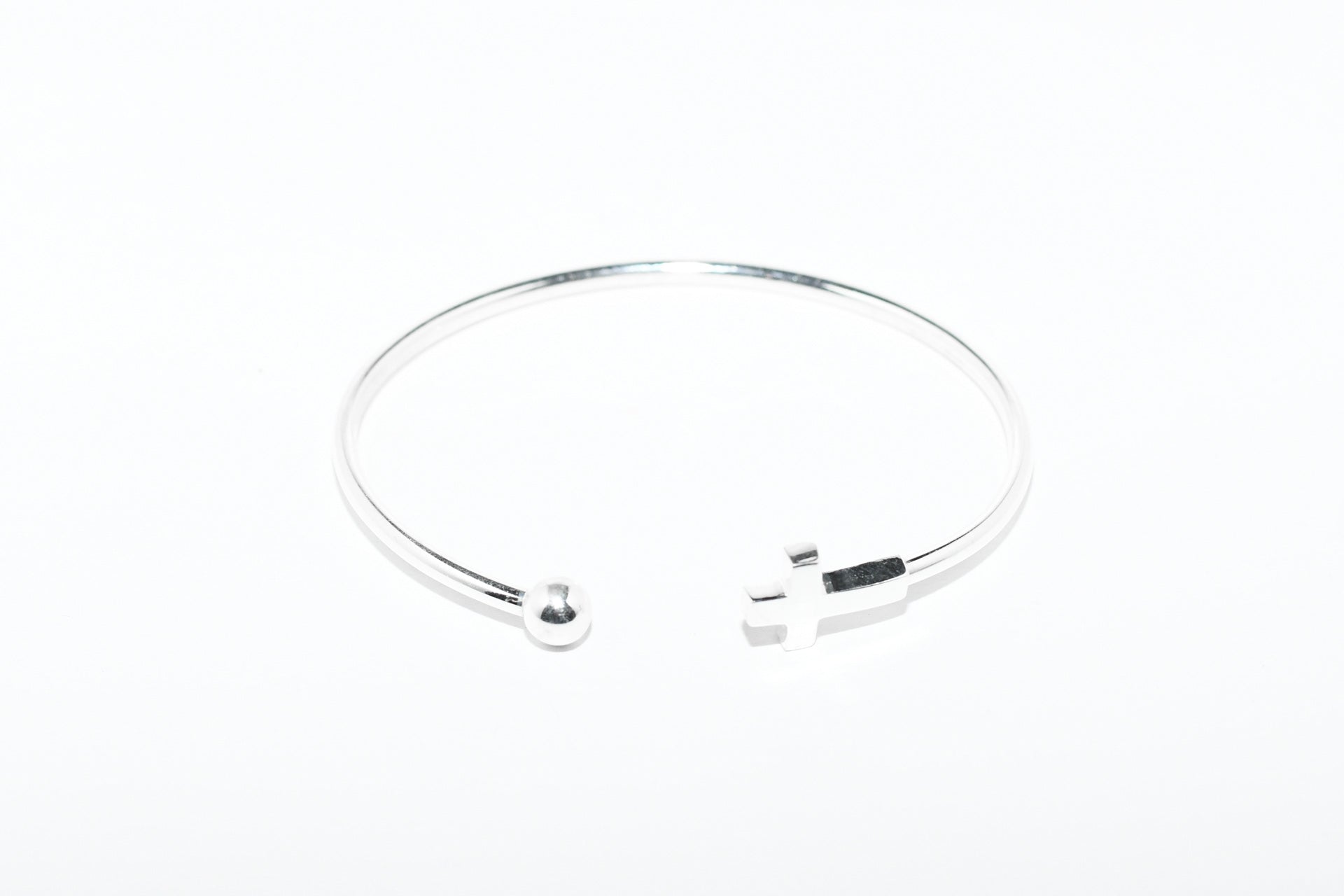 Pulsera plata cruz y bola Hippie Crew