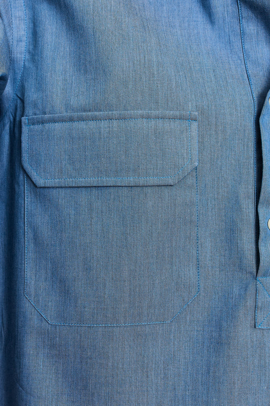 Camisa polera bolsillos denim